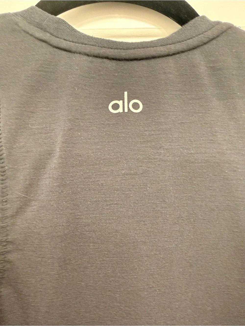ALO top with side cutouts